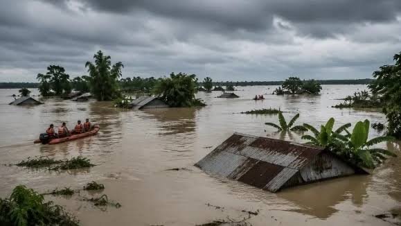 Homes submerged by floodwater in Assam